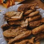 fried fish on white ceramic plate